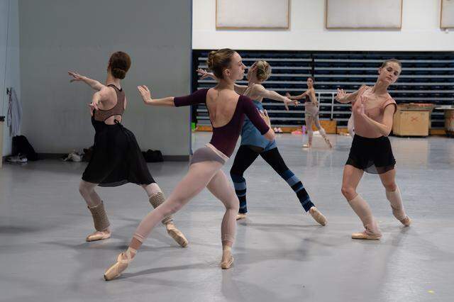 MCB Dancers rehearsing a circle formation resembling a necklace in Rubies, Jewels. Choreography by George Balanchine.